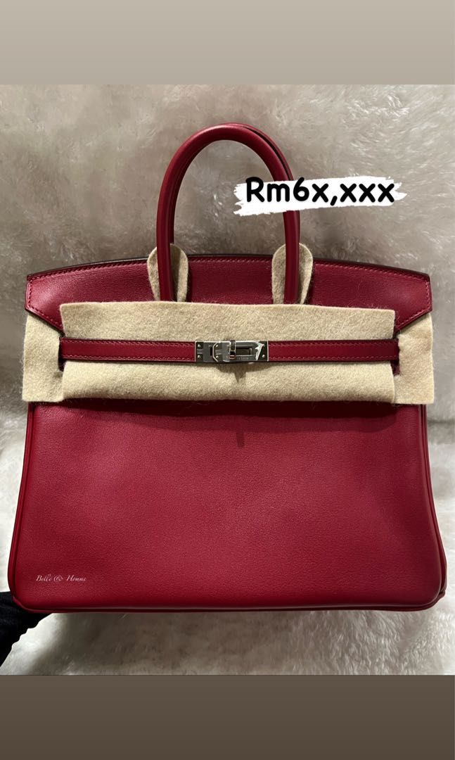 A ROUGE GRENAT SWIFT LEATHER RETOURNÉ KELLY 25 WITH GOLD HARDWARE