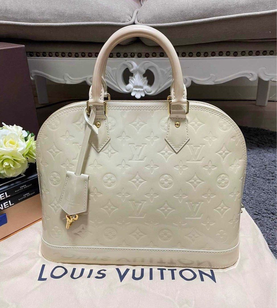 Louis Vuitton Alma Vernis MM (Category: Luxury Bags & Wallets) located in Makati City. Submitted by karaalexandra (Listing ID 1198275514, Image 1). Description: Authentic Louis Vuitton Alma Vernis MM With dustbag Negotiable for sure buyer..