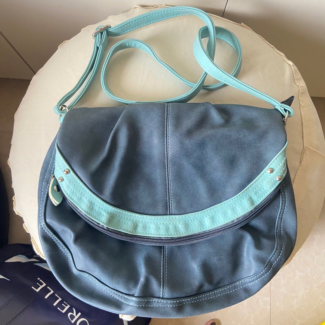 Egg sling bag price sales