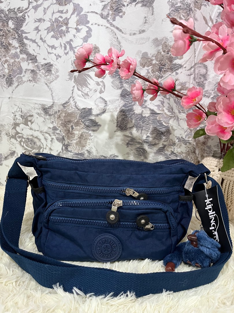 KIPLING BLUE SLING BAG ✓ PRICE: - Madam's Pre-Loved Bags