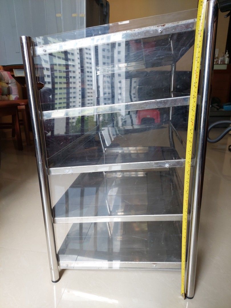 Stainless Steel Rack shelf with slanting shelvings and acrylic covers on both sides., Furniture