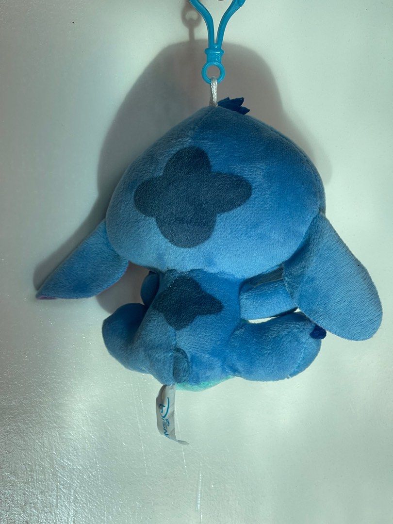 Stitch Keychain Plushy (Category: Plushies & Soft Toys) located in San Isidro. Submitted by zora.ph (Listing ID 1198302649, Image 3). Description: Brand new Stitch plushy keychain for sure buyers. 2nd pic for reference. I have 3 of these..