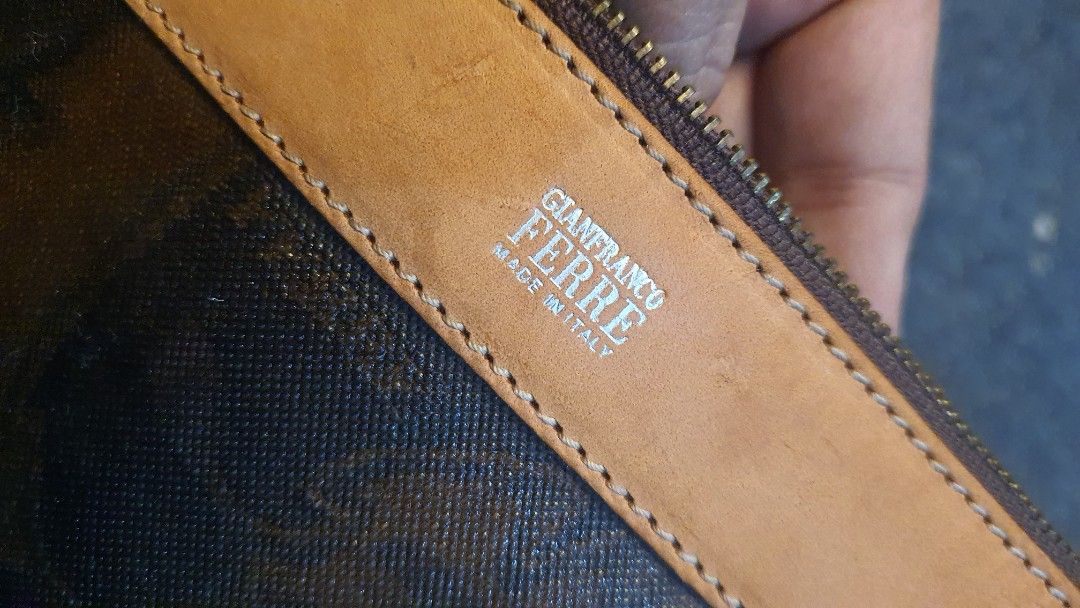 Authentic gianfranco ferre pouch (Category: Luxury Bags & Wallets) located in Cavite. Submitted by ohmie23 (Listing ID 1198615897, Image 3). Description: Authentic gianfranco ferre pouch.