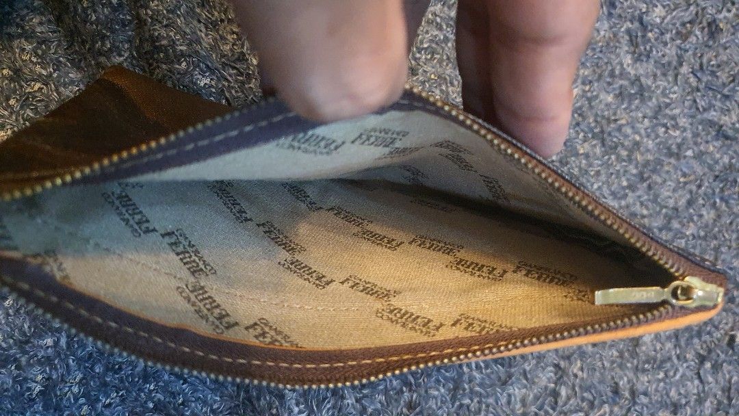 Authentic gianfranco ferre pouch (Category: Luxury Bags & Wallets) located in Cavite. Submitted by ohmie23 (Listing ID 1198615897, Image 2). Description: Authentic gianfranco ferre pouch.