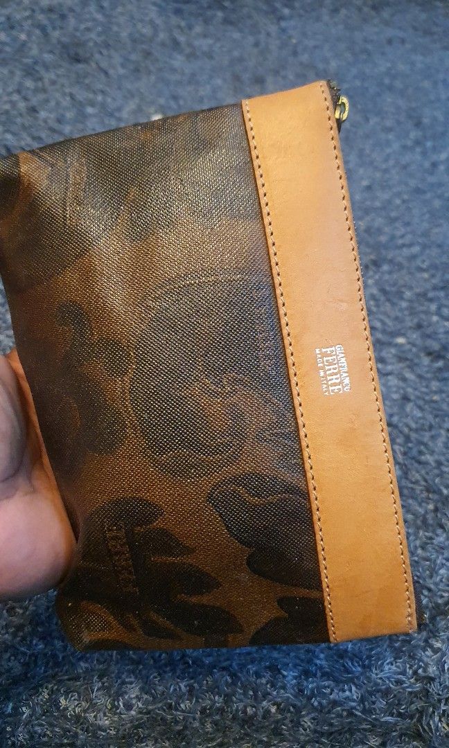 Authentic gianfranco ferre pouch (Category: Luxury Bags & Wallets) located in Cavite. Submitted by ohmie23 (Listing ID 1198615897, Image 1). Description: Authentic gianfranco ferre pouch.