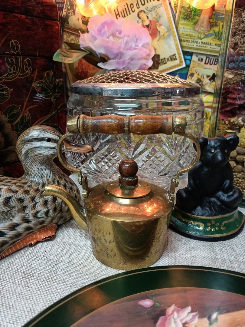 Premium Photo  Antique brass teapot on vintage wood table