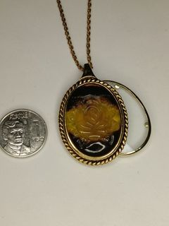 Cameo, mirror, magnifying glass pendant,