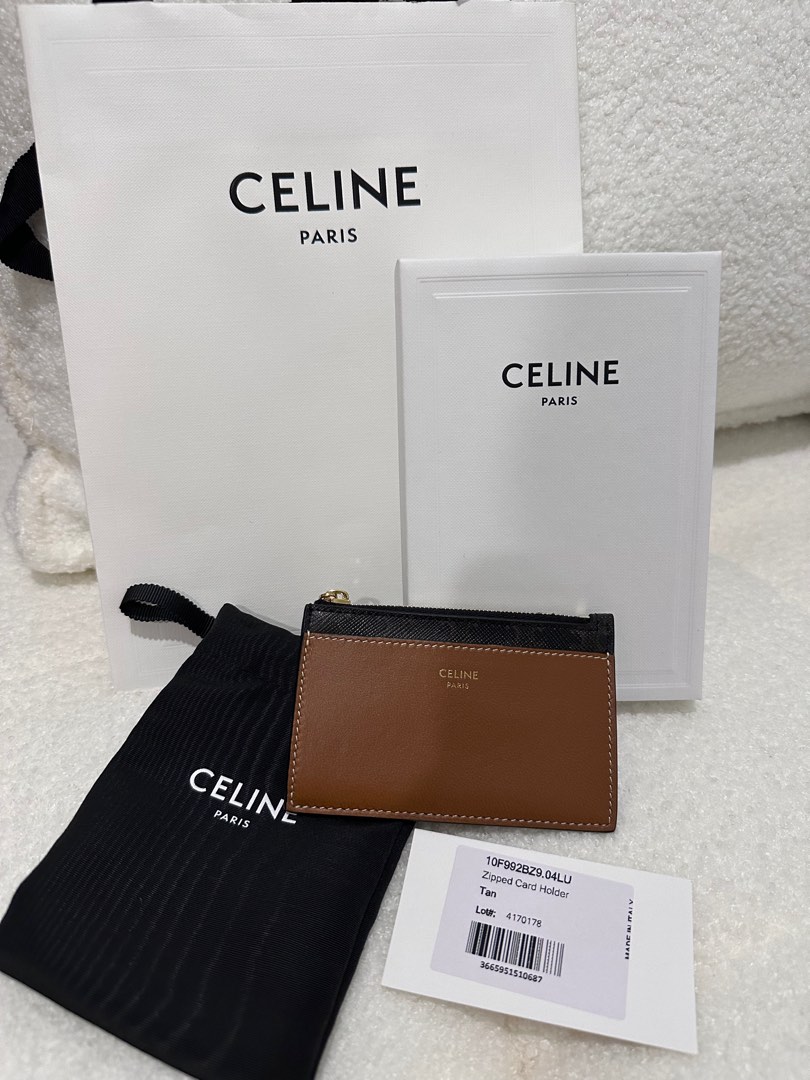 Shop CELINE Triomphe Canvas Zipped card holder in triomphe canvas