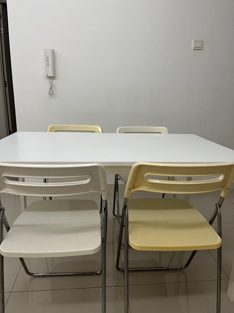 IKEA Table Set Melltorp table (125cm x 75cm) & Nisse Folding Chair