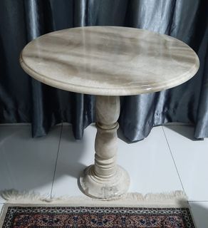 Natural marble side tables for indoor or outdoor use.