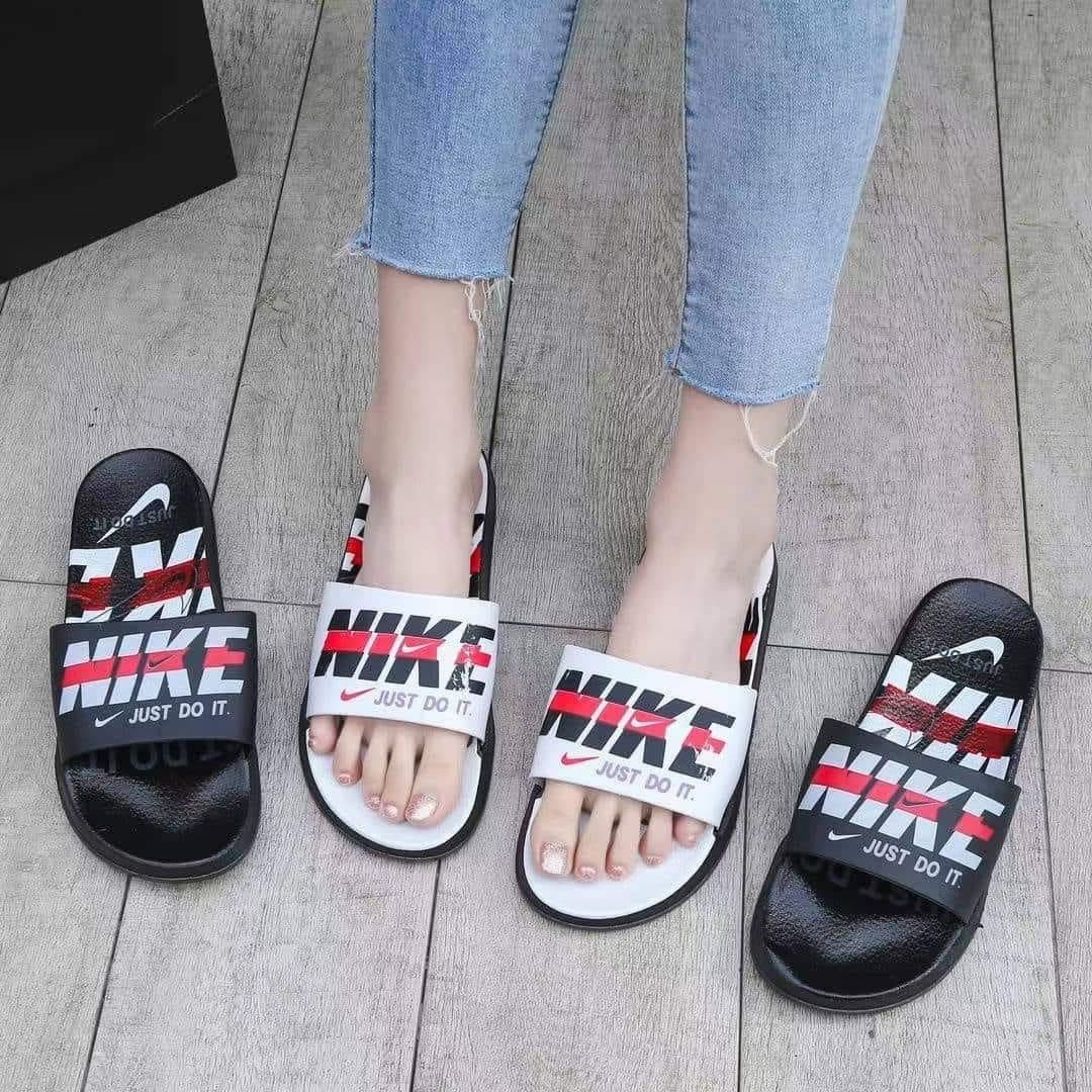 Nike slippers couple hot sale