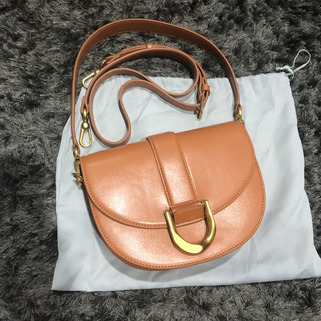 Charles & Keith Gabine Saddle Bag (M), Women's Fashion, Bags & Wallets,  Shoulder Bags on Carousell