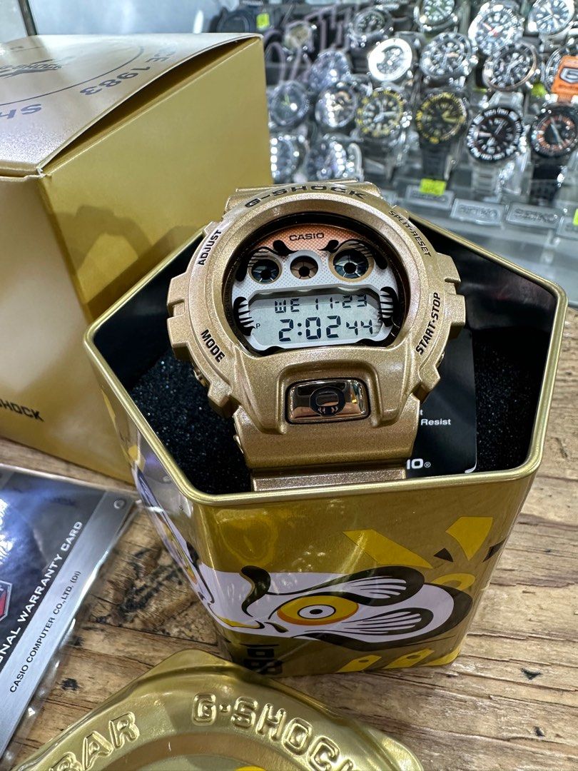 金色達摩G-SHOCK DW-6900GDA-9DR, 名牌, 手錶- Carousell