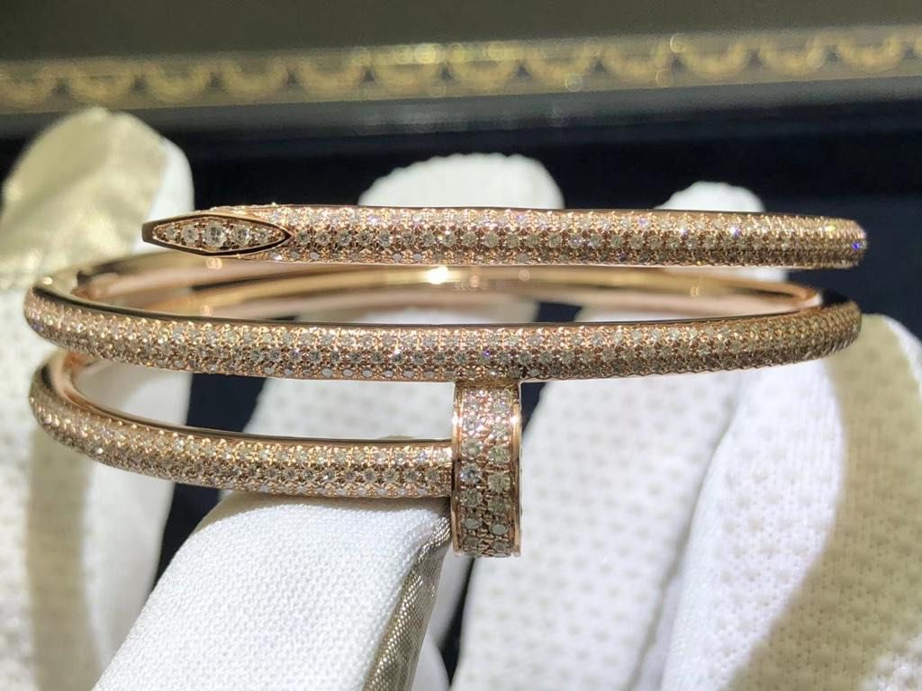 Cartier nail sales bracelet iced out