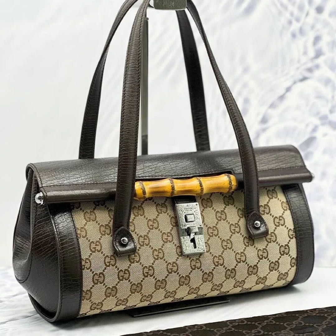Gucci GG Canvas Small Bullet Bag