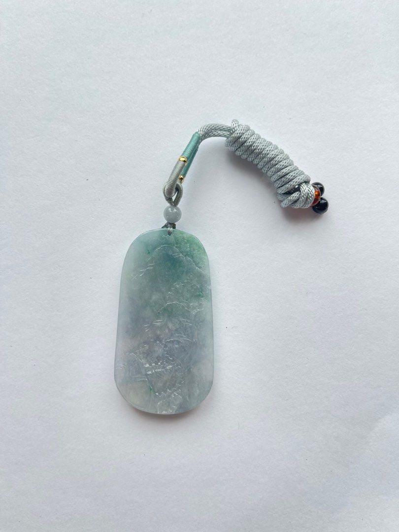 Carved jade hotsell necklace