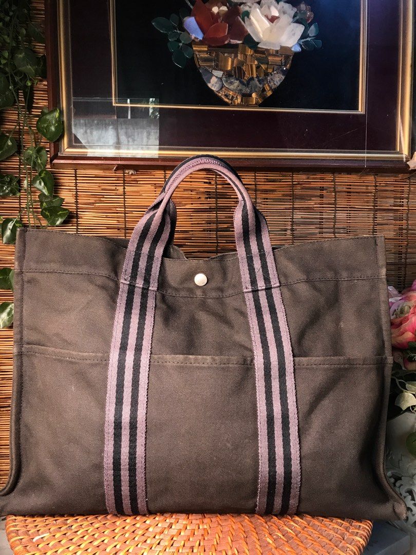 HERMES. Vintage Tote Bag (Category: Luxury Bags & Wallets) located in Quezon City. Submitted by whatsinmyclosett (Listing ID 1198758685, Image 2). Description: HERMES. Vintage Tote Bag ☑️Item in Japan ☑️ good Condition ☑️Vintage ☑️branded ☑️42 X 31 CM ☑️Canvas ☑️Manage your Expectations this is Second hand, Vintage item. Hindi Brand New Binibili mo 🔴The bag is Good condition., the flaw is in Last Photo., Hermes Alam mo naman mahal Ang brand na y