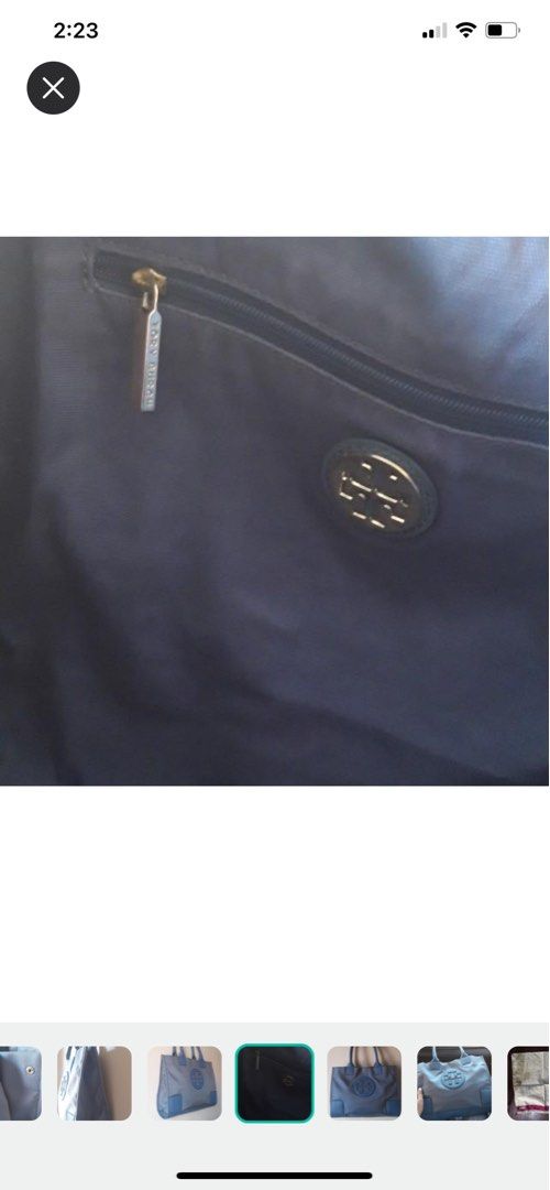 Authentic Tory Burch Bag (Category: Luxury Bags & Wallets) located in Mandaluyong City. Submitted by byolivia_finejewelry (Listing ID 1198927773, Image 2). Description: Authentic Tory Burch Bag. RFS: too many bags no space for storage sayang lang. Honest issue, may tearing ma sa handle. If you need more pictures or video, let me know :) thanks! Needs cleaning though. .