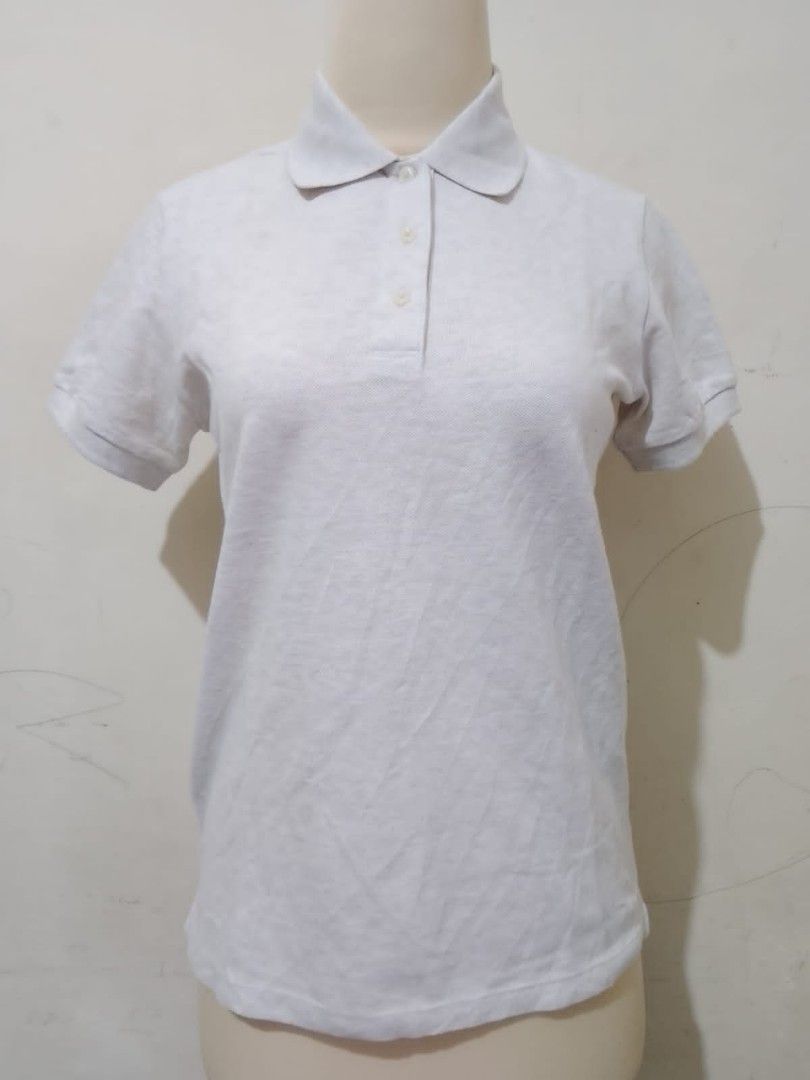Polo shirt merk Uniqlo, Fesyen Wanita, Pakaian Wanita, Atasan di Carousell