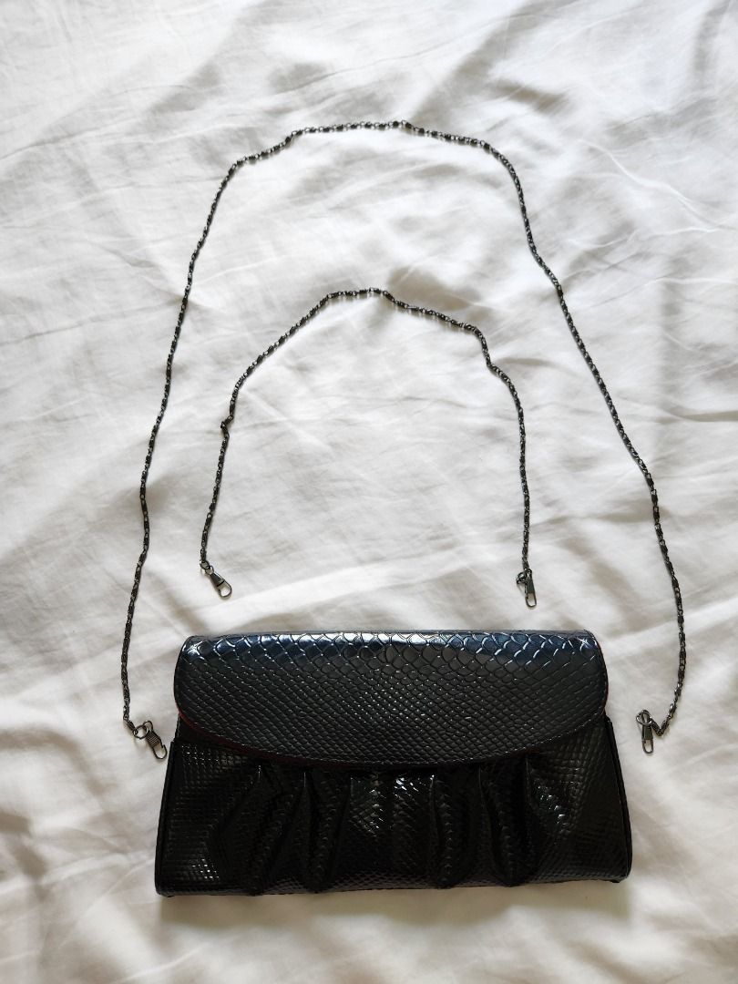 Red and black best sale clutch