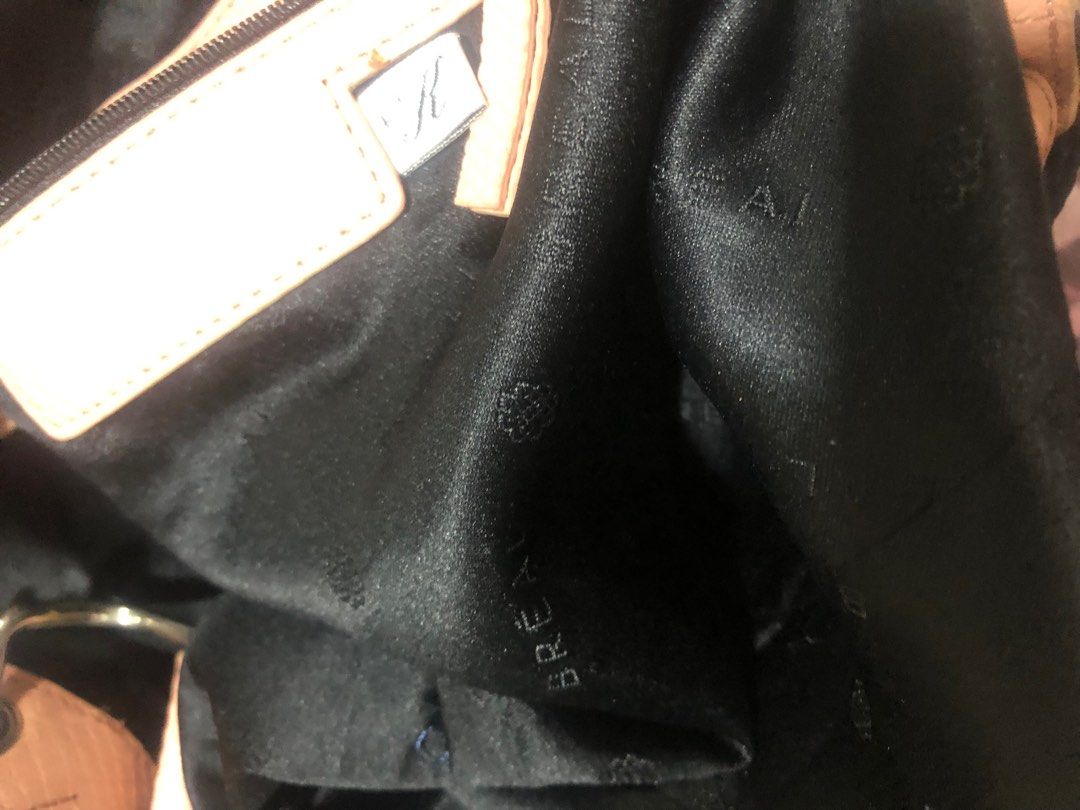 Original Breal big hobo bag (Category: Luxury Bags & Wallets) located in Angono. Submitted by fhlor02 (Listing ID 1199193319, Image 3). Description: Original Breal big hobo bag, no rubs on d edges and on d handle, unused condition, flaw: missing zipper head on d handle, 12”by16”by6”.