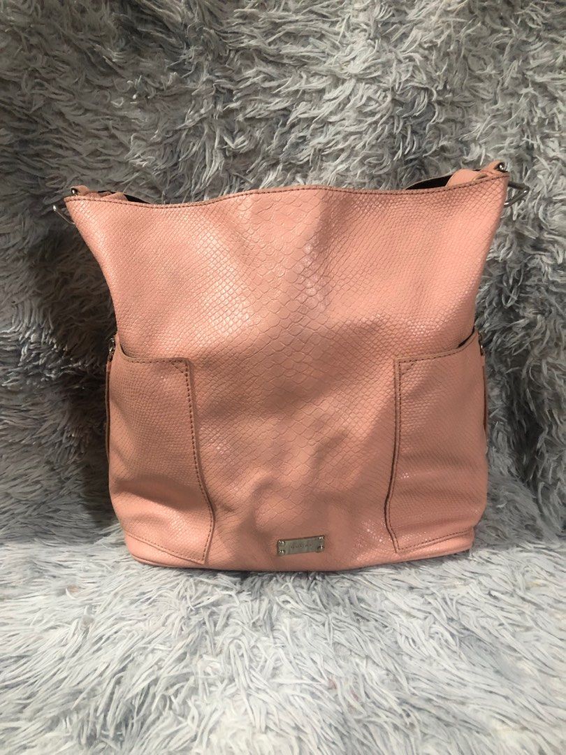 Original Breal big hobo bag (Category: Luxury Bags & Wallets) located in Angono. Submitted by fhlor02 (Listing ID 1199193319, Image 2). Description: Original Breal big hobo bag, no rubs on d edges and on d handle, unused condition, flaw: missing zipper head on d handle, 12”by16”by6”.