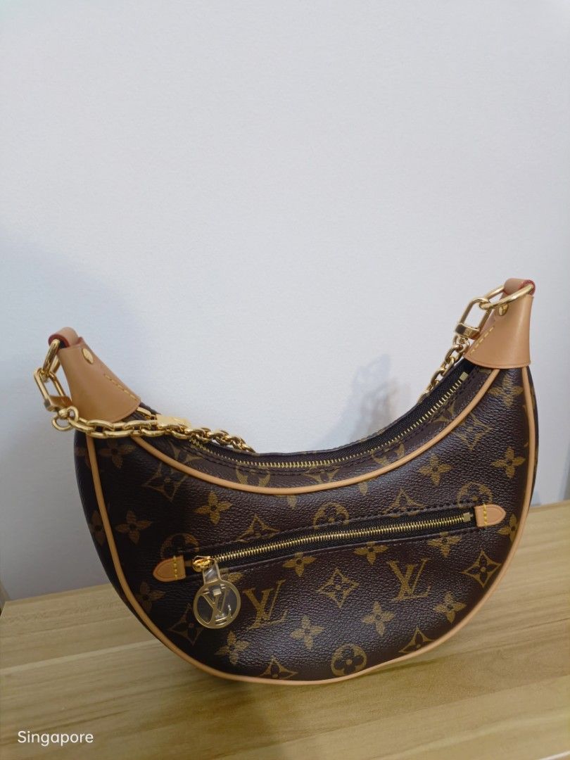 LV Loop Monogram (Category: Bags & Wallets) located in Singapore. Submitted by MatchaBunny (Listing ID 1199190861, Image 3). Description: Original price: $3450 Bought in 2022, latest model Highly sought after. Original receipt to show for authentication Used lightly, no scratches Cloth bag included.