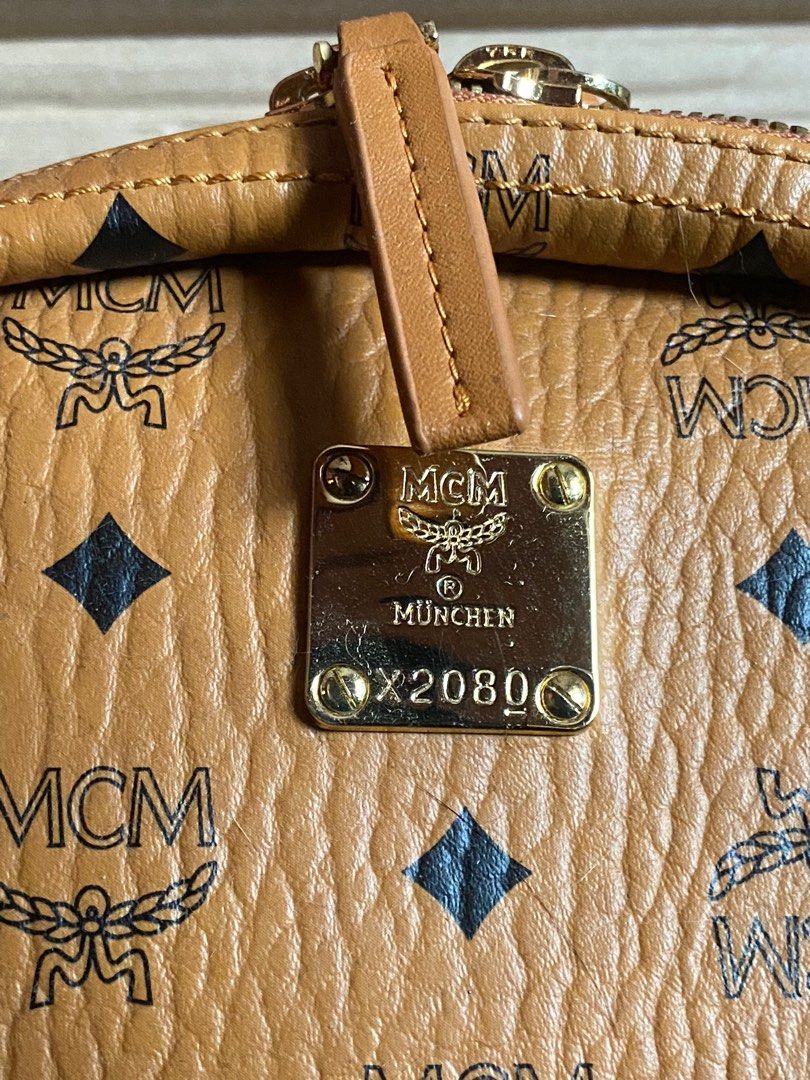 Mcm bag clearance original vs fake