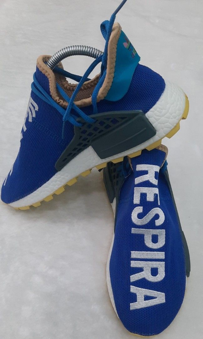 Human race shoes gold on sale