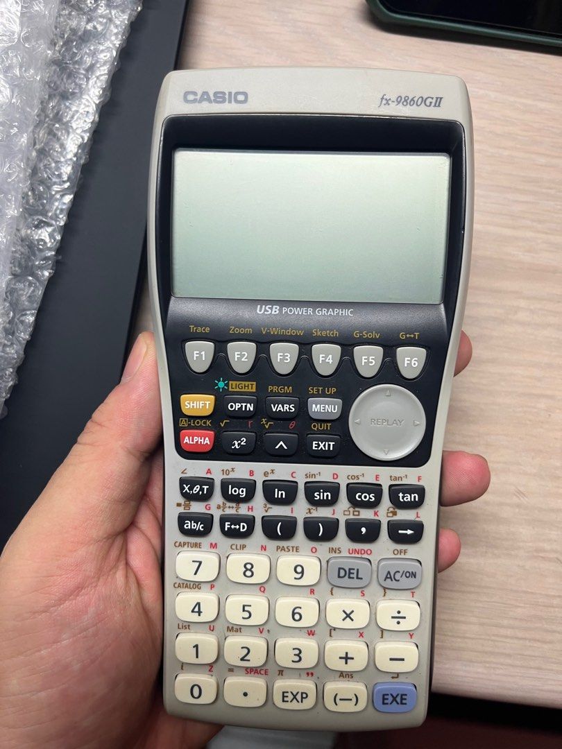 Casio fx9860Gii graphic calculator Hobbies Toys Stationery