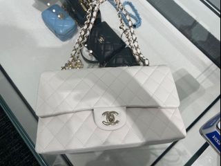 sold*Chanel White Caviar Medium Classic Flap in 24K GHW, Women's Fashion,  Bags & Wallets, Cross-body Bags on Carousell