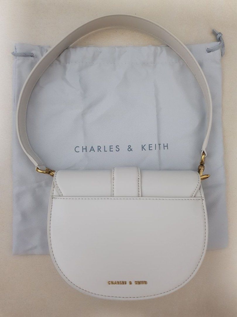 Charles & Keith Mini Gabine Saddle Bag in Cream, Women's Fashion, Bags
