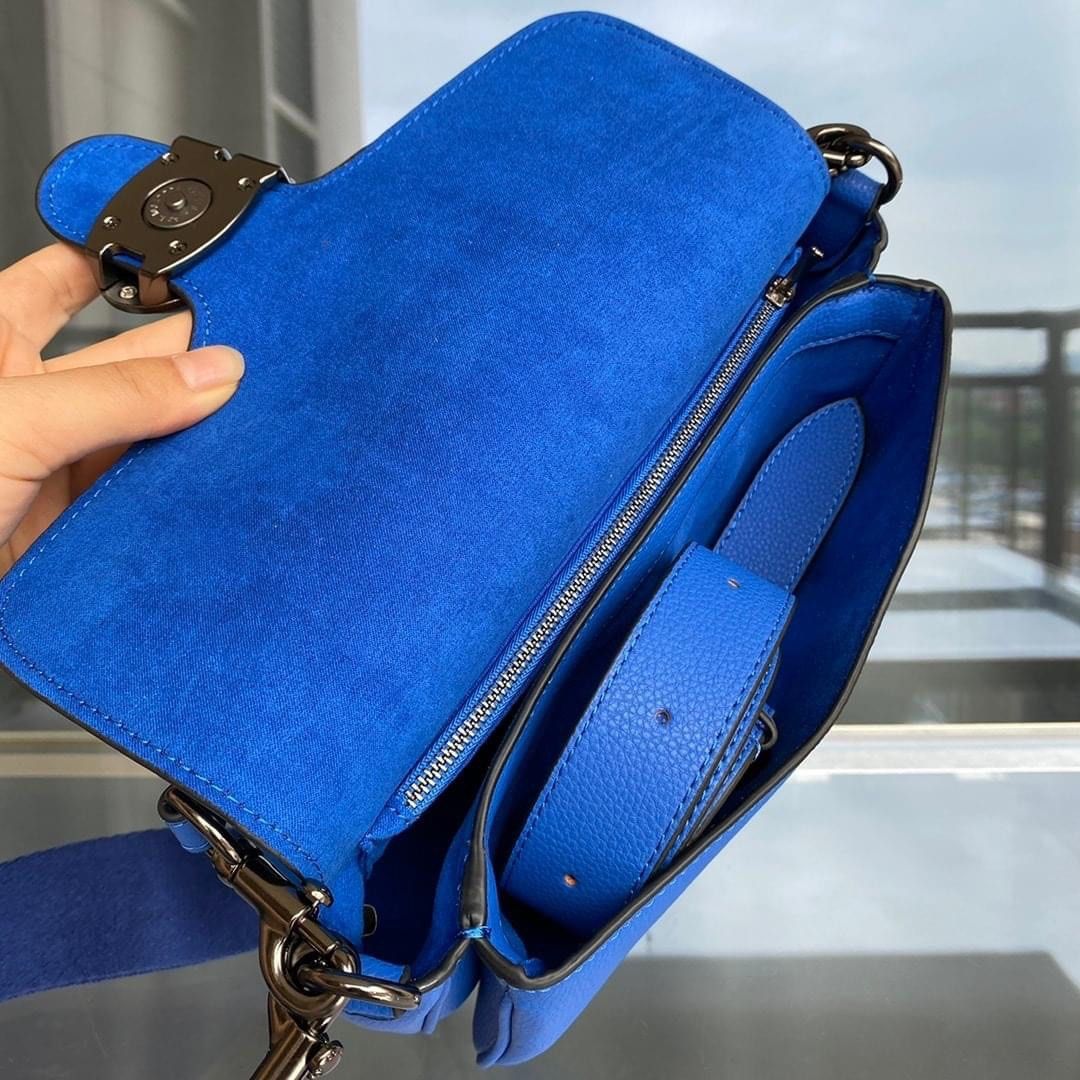 Coach blue sling sale bag