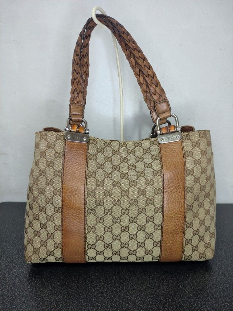 Gucci braided hotsell handle bag