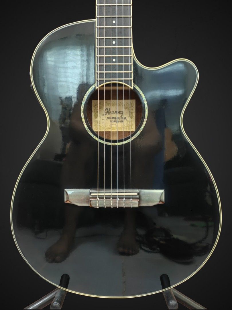 Ibanez Nylon Guitar (Category: Musical Instruments) located in Talisay. Submitted by kim_rey (Listing ID 1098357390, Image 1). Description: BodyShape: AEG Body Neck: Mahogany Neck (14th Fret Neck/Body Joint) BackSides: Mahogany Back and Sides Top: Spruce Top Rosette: Abalone Rosette Tuners: Gold Classical Tuners Pickup: Fishman Sonicore Pickup Electronics: Ibanez AEQ-SP1 preamp with onboard tuner Outputs: Balanced 1/4" Fretboard: Rosewood Bridge 