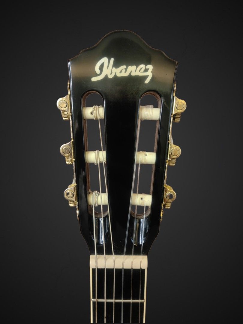 Ibanez Nylon Guitar (Category: Musical Instruments) located in Talisay. Submitted by kim_rey (Listing ID 1098357390, Image 2). Description: BodyShape: AEG Body Neck: Mahogany Neck (14th Fret Neck/Body Joint) BackSides: Mahogany Back and Sides Top: Spruce Top Rosette: Abalone Rosette Tuners: Gold Classical Tuners Pickup: Fishman Sonicore Pickup Electronics: Ibanez AEQ-SP1 preamp with onboard tuner Outputs: Balanced 1/4" Fretboard: Rosewood Bridge 