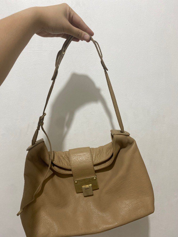 Jimmy Choo (Category: Shoulder Bags) located in Paranaque City. Submitted by closedcycle (Listing ID 1199364135, Image 2). Description: Looks imitation to me but a quality one! Just needs cleaning.