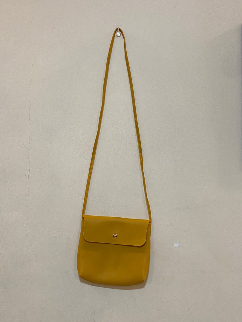 rubi yellow sling bag, Women's Fashion, Bags & Wallets, Crossbody Bags on Carousell