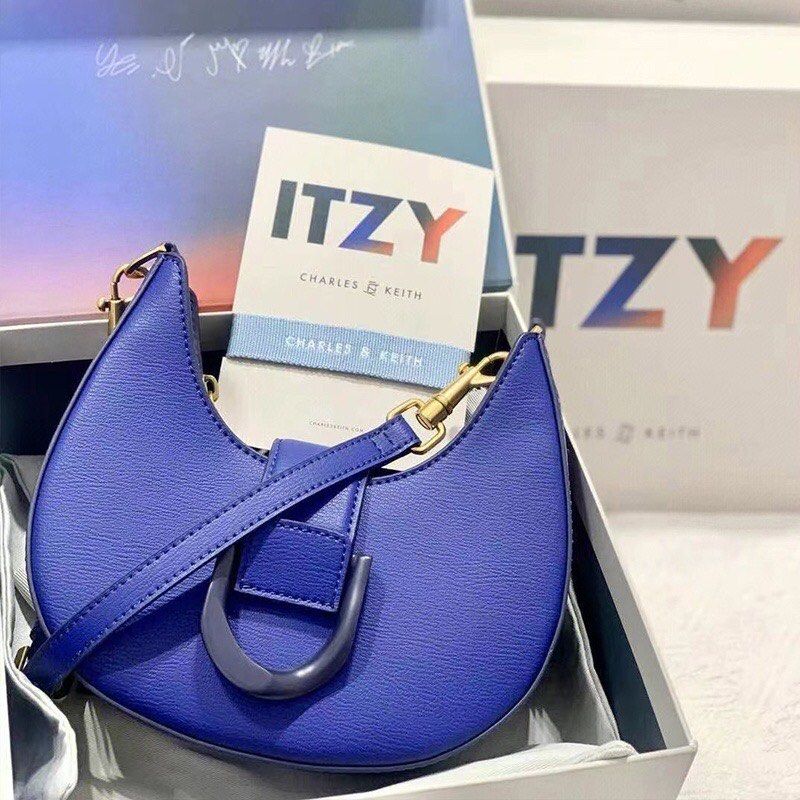 itzy x charles & keith bag, Women's Fashion, Bags & Wallets, Cross-body  Bags on Carousell