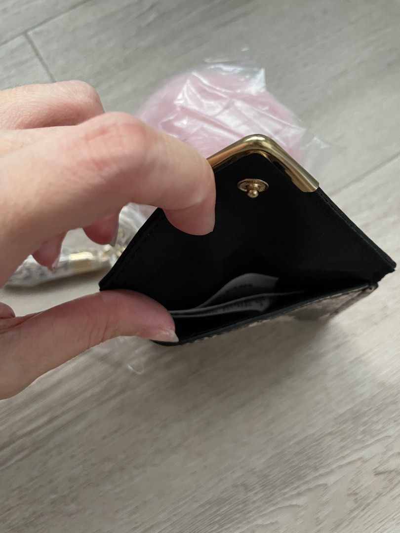 Aldo keychain with purse and pom pom ball