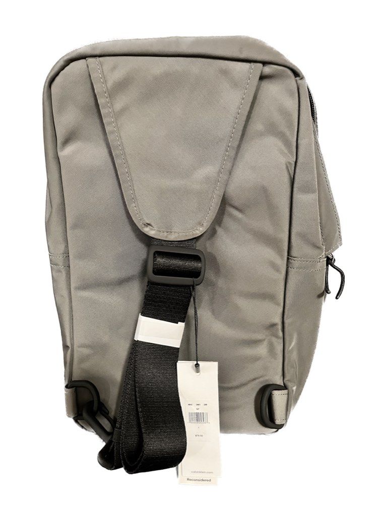 Calvin Klein Men’s Crossbody Bag (Category: Sling Bags) located in Manila. Submitted by fablee (Listing ID 1199583236, Image 2). Description: 💯% Authentic & Original, personally important from USA * #CalvinKlein Men’s Cross Body Bag * #CK * Material: Nylon * Color: Grey * Dimensions: 13x8x2inches * You can checkout the item at our shop: https://shopee.ph/fablee.