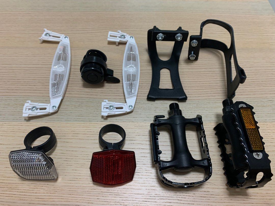 Decathlon bicycle pedals, reflectors, and a bell, Sports Equipment