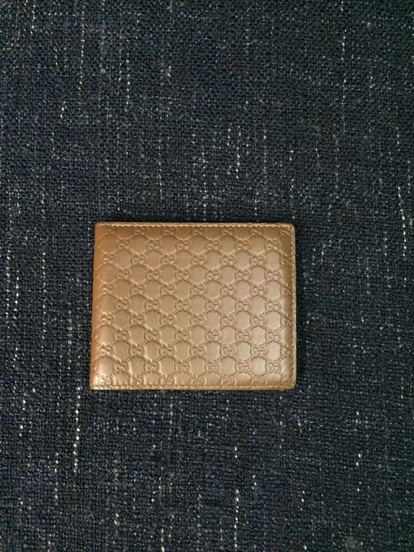 Gucci Guccissima Bi-Fold Wallet (Category: Luxury Bags & Wallets) located in Baguio. Submitted by BagstacularbyJCT (Listing ID 1199605817, Image 1). Description: Gucci Guccissima Bi-fold wallet Brown Color 8 Card Slots 2 Bill Compartments Dimensions Open : W21cm x H9cm Closed : W11cm x H9cm Inclusions Original Box, Product Inserts, wrap paper Original Product Care booklet Original Gucci Responsibility booklet .