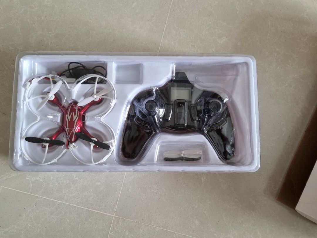 Mini drone with camera (Category: Drones) located in Singapore. Submitted by jiayii_1 (Listing ID 1199478025, Image 3). Description: mini drone for sale. Used for a few times. comes with : 1 charger, 3 batteries, 3 extra propellers open to negos..