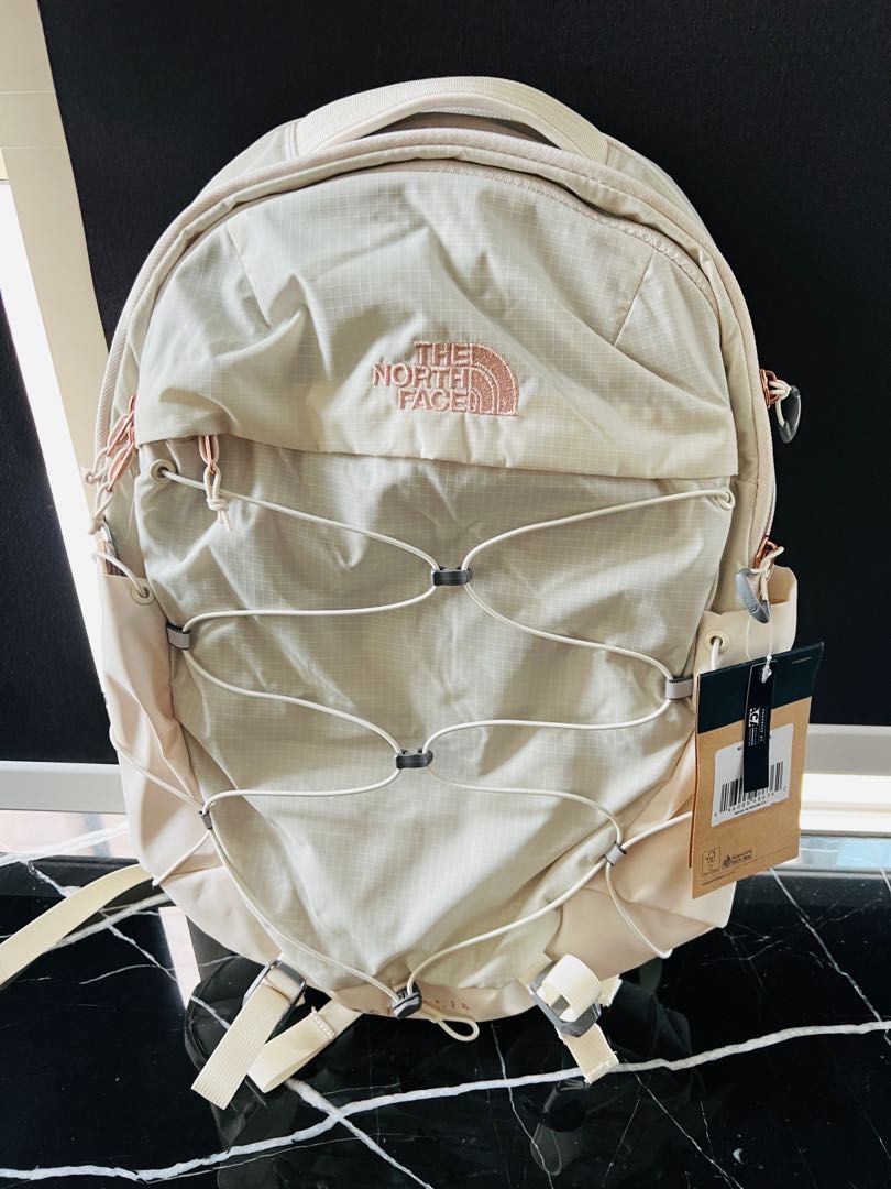 White and pink north face backpack online