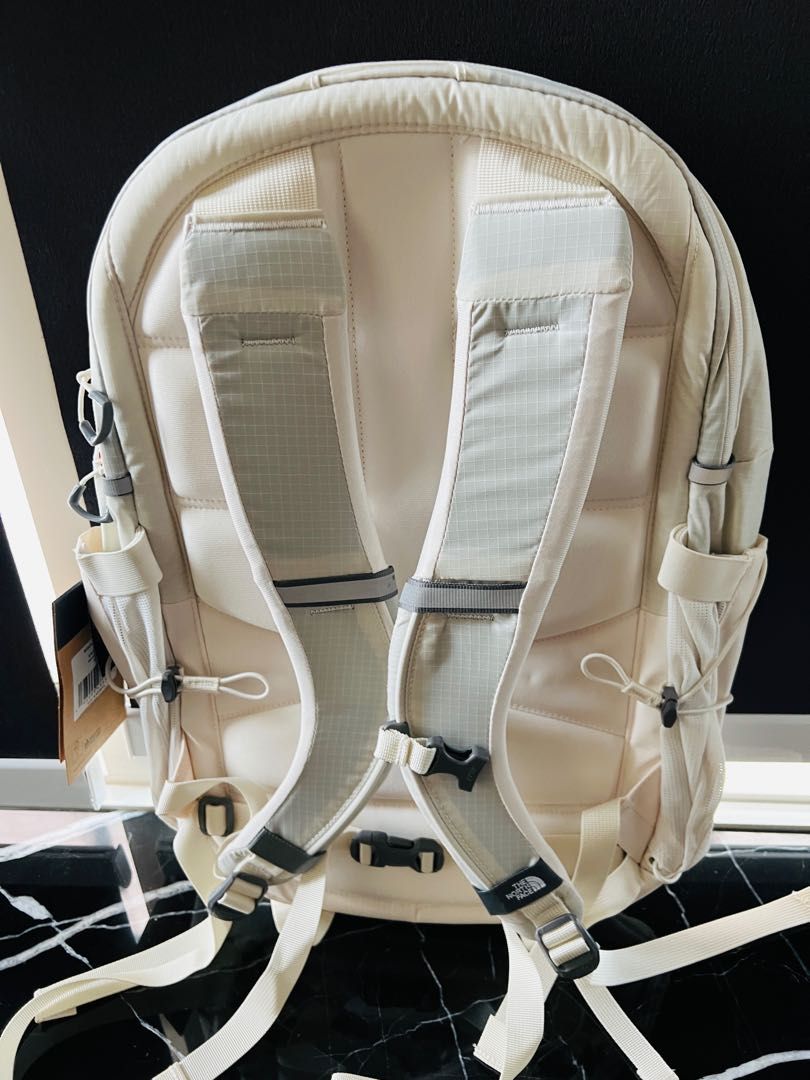 White and gold north face backpack store
