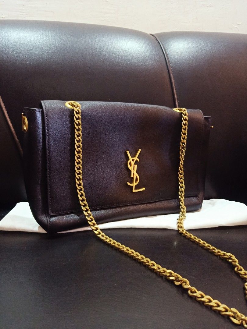 Preloved YSl sling bag (Category: Luxury Bags & Wallets) located in Cebu City. Submitted by day.98 (Listing ID 1199434892, Image 2). Description: from singapore genuine leather no flaws with dust bag coded meduim size.
