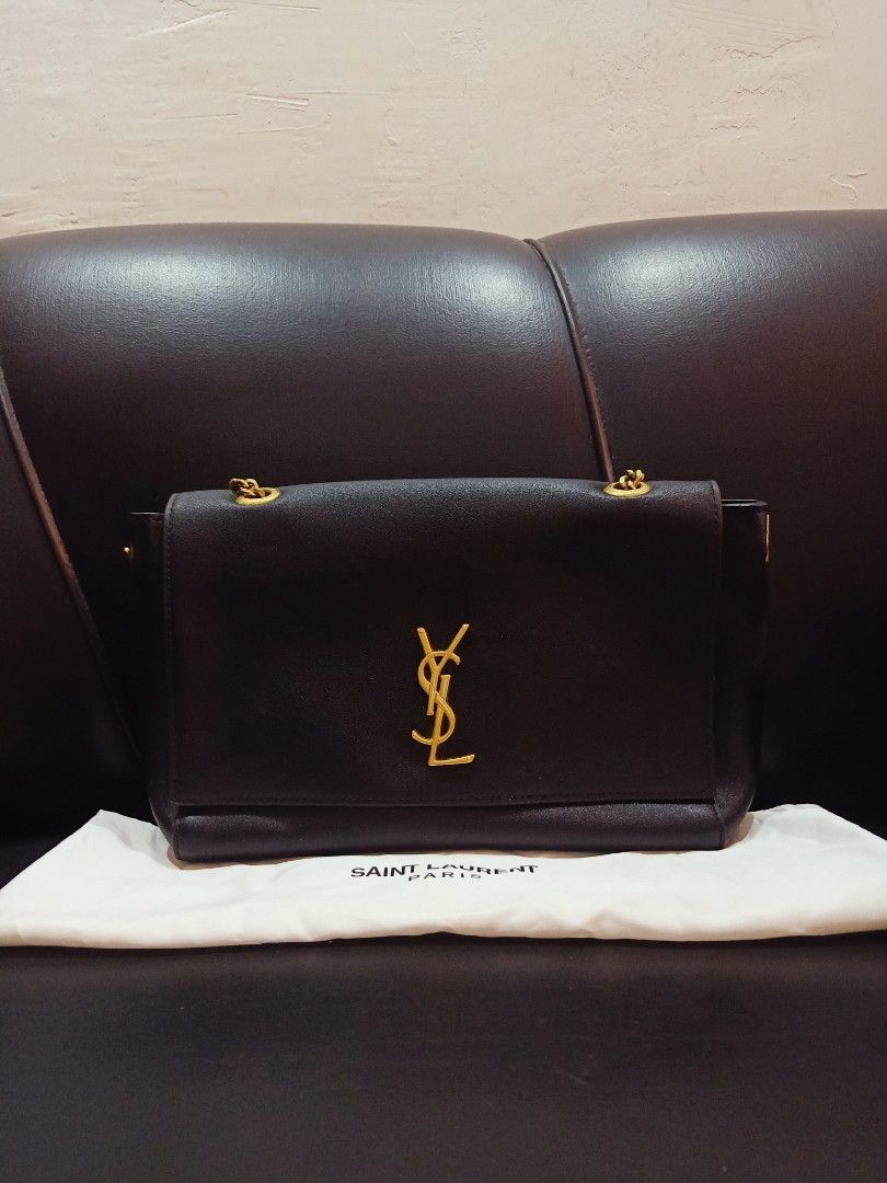 Preloved YSl sling bag (Category: Luxury Bags & Wallets) located in Cebu City. Submitted by day.98 (Listing ID 1199434892, Image 1). Description: from singapore genuine leather no flaws with dust bag coded meduim size.