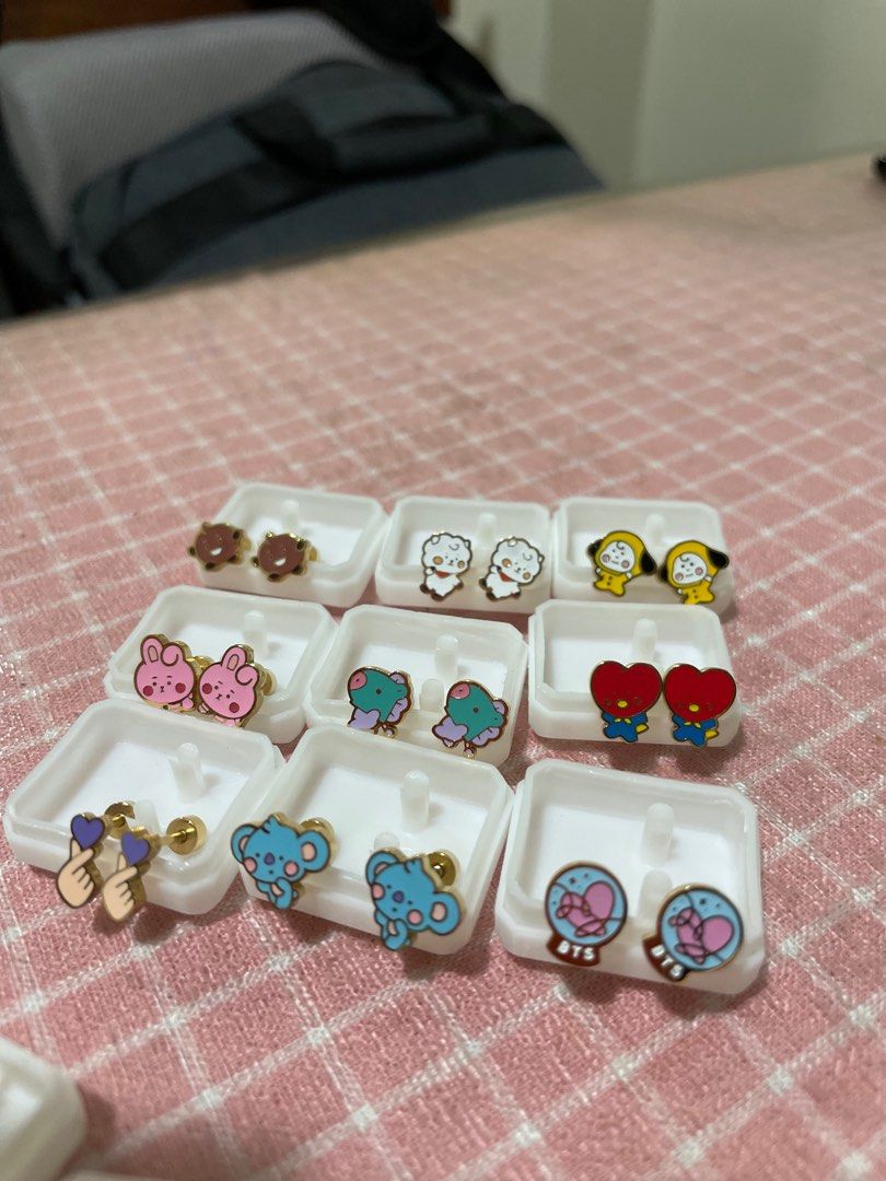 KPop BTS BT21 earrings set (Category: Earrings) located in Taguig. Submitted by adethmae (Listing ID 1199692730, Image 1). Description: 9 pcs BTS BT21 KPop stainless steel de roscas earrings Hypoallergenic. Made up of high quality stainless steel. Sold as set. #KPOP #Korea #BTS .