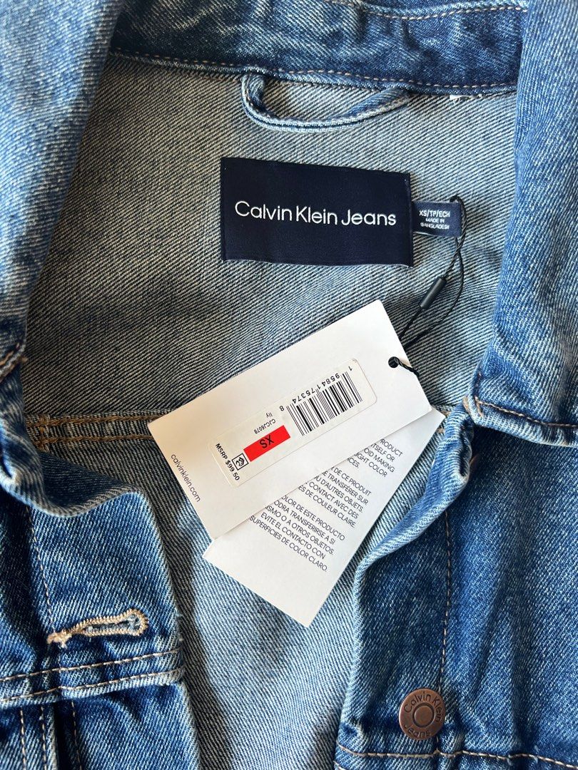 Calvin klein coat tag on sleeve online